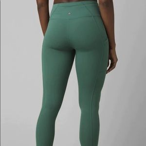 PrAna green leggings. Pocket on each leg. High rise. Full length. Size large